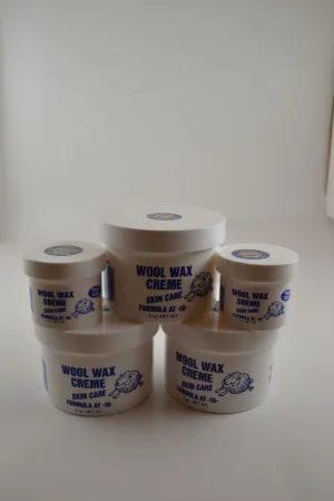 3 Nine ounce jars and 2 two ounce jars Wool Wax Creme