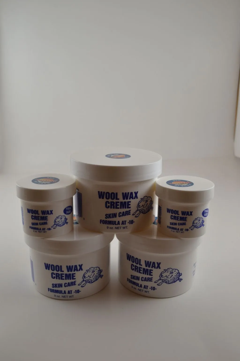 3 Nine ounce jars and 2 two ounce jars Wool Wax Creme