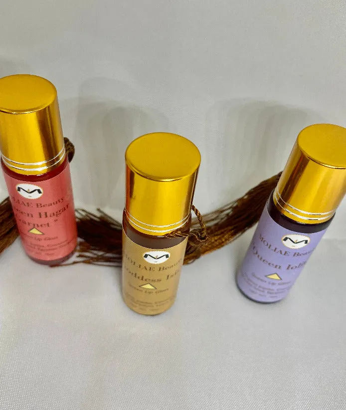 Topaz Oasis Queen | Queen Hagar Garnet | Lip Oil Gloss | Strawberry Seed | Egyptian Geranium | Jojoba | Coconut